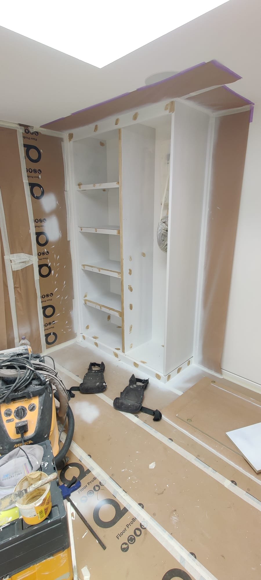 Bespoke joinery prepped and masked on site before spraying